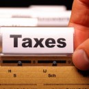 tax or taxes concept with word on business folder index blog